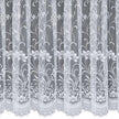 White net curtain with a vertical floral design against a grey background