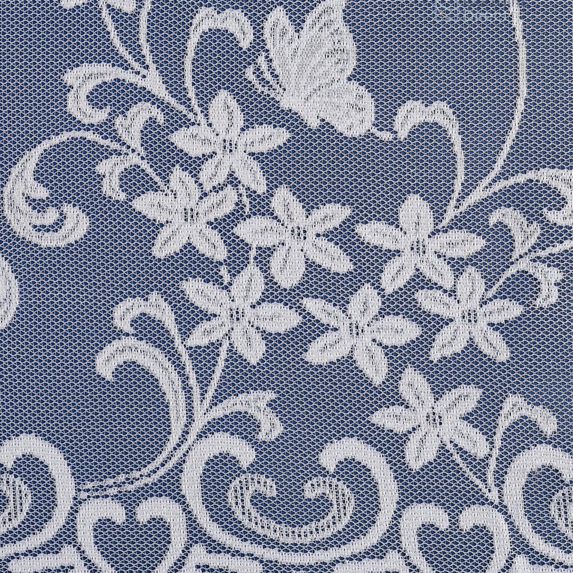 Lace fabric with floral and embroidered butterflies on a blue background