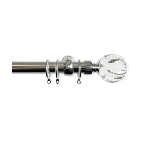 Silver metal curtain pole with crystal ball finial on a white background