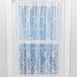 Sheer white floral lace curtain panel on a light blue background