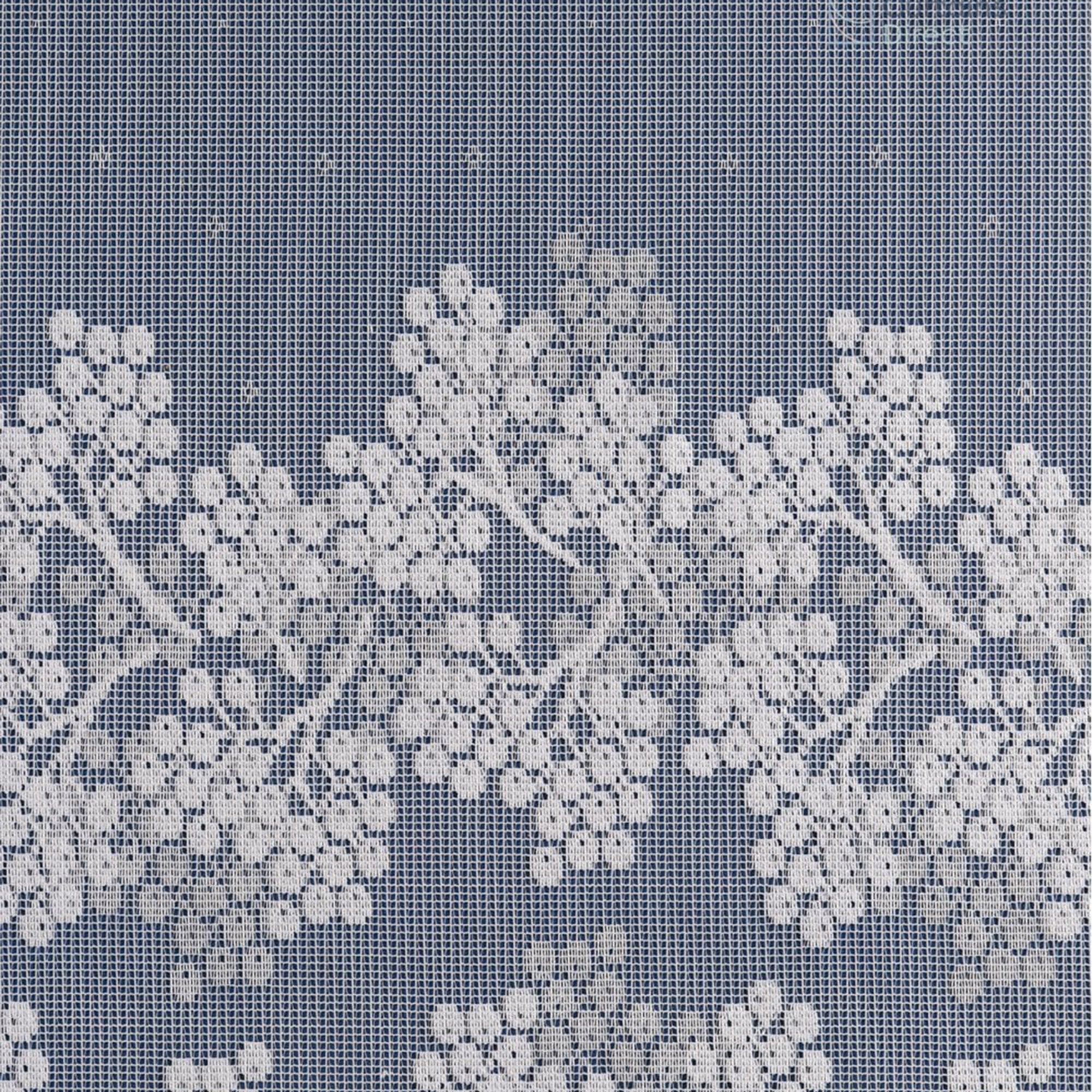 Decorative white floral pattern on a blue background