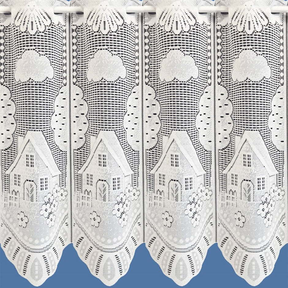 White net curtain with house and cloud pattern on a blue background