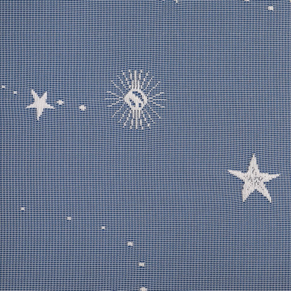 Pattern of stars and moons on lace curtains against a textured blue background