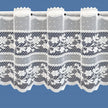 Lace curtain with floral patterns on a blue background
